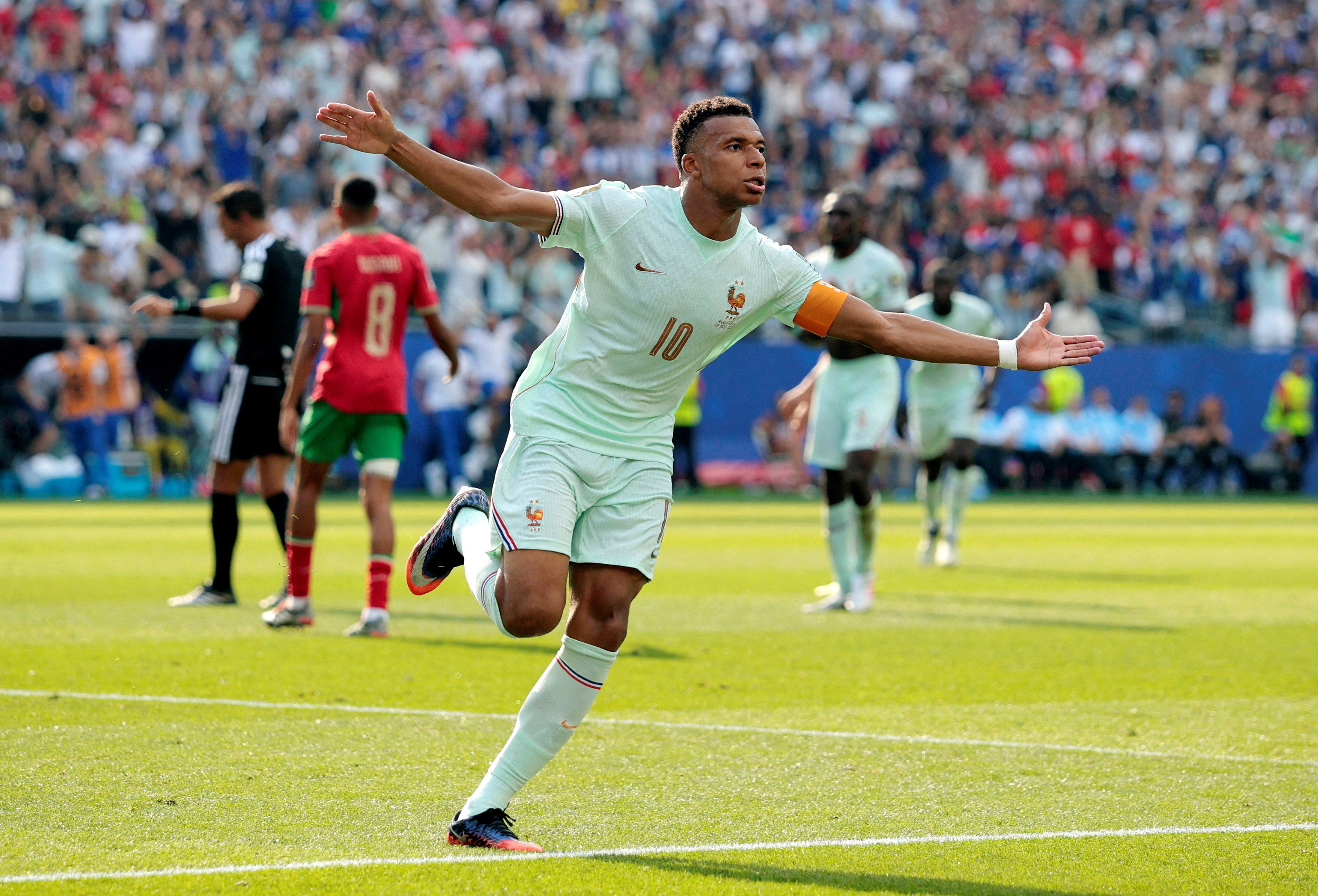 Mbappe, Dembele fire France into semis with win over Morocco