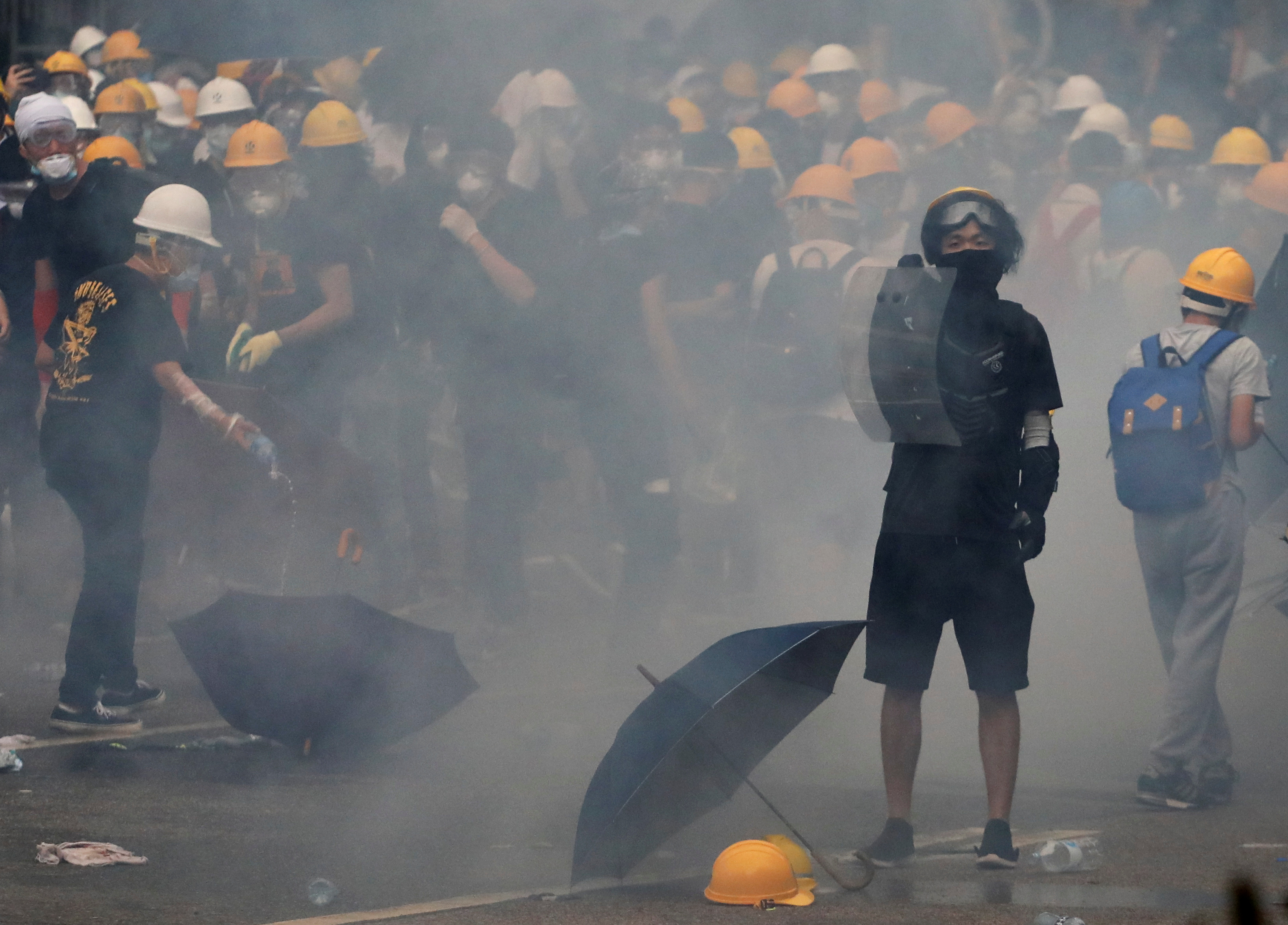 Protesters scuffle with Hong Kong police
