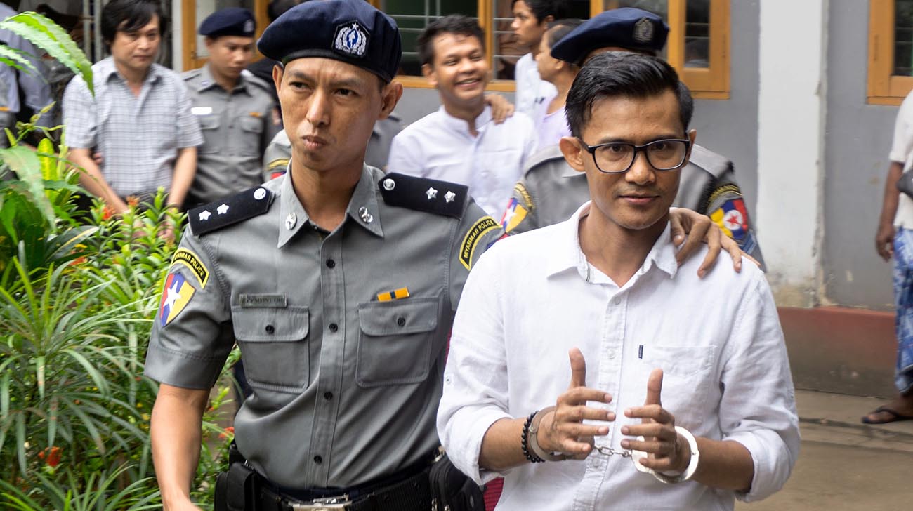 Myanmar arrests three journalists over report on Suu Kyi protege