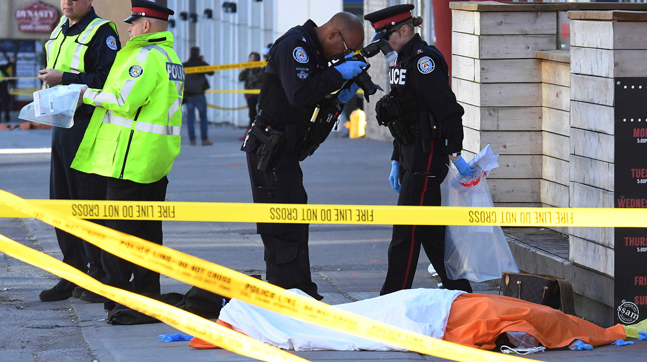 Driver kills 10 plowing van into Toronto sidewalk crowd