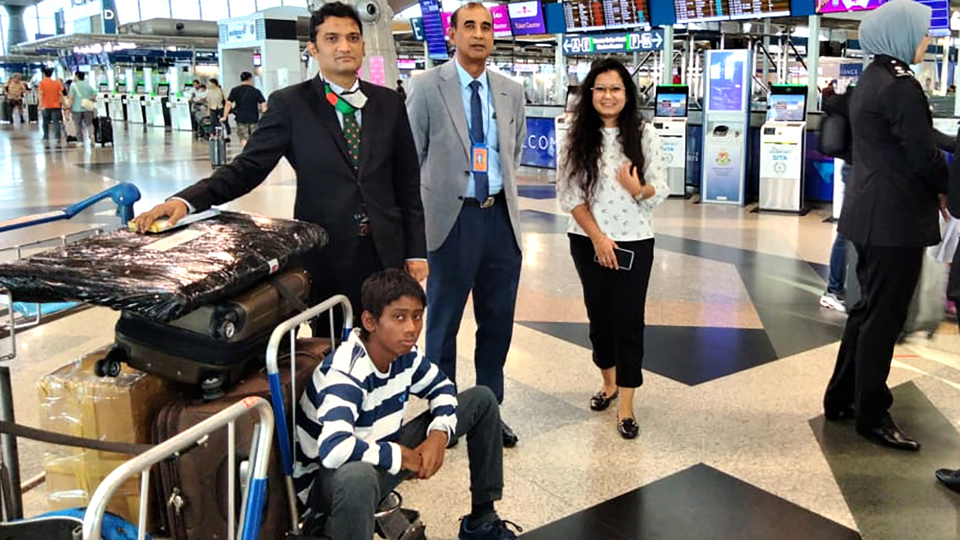 Boy rescued from container in Malaysia arrives in Dhaka