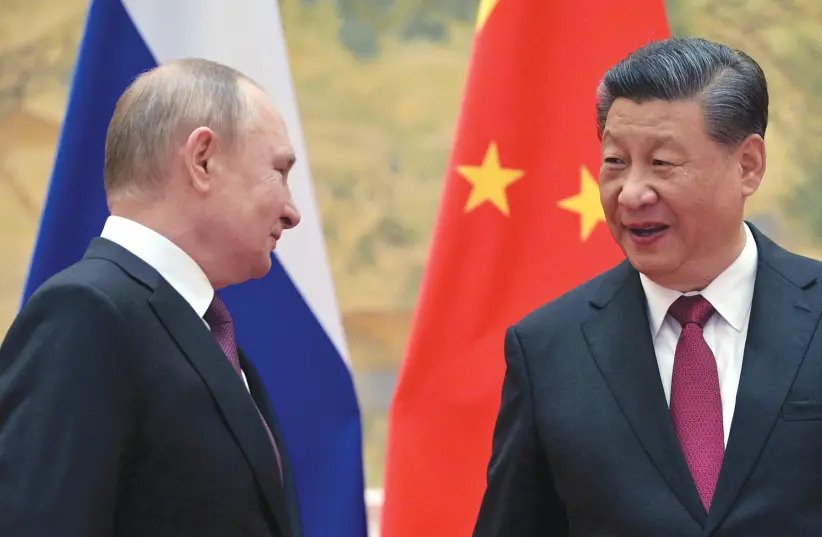 China's top diplomat says Russia ties 'rock solid'