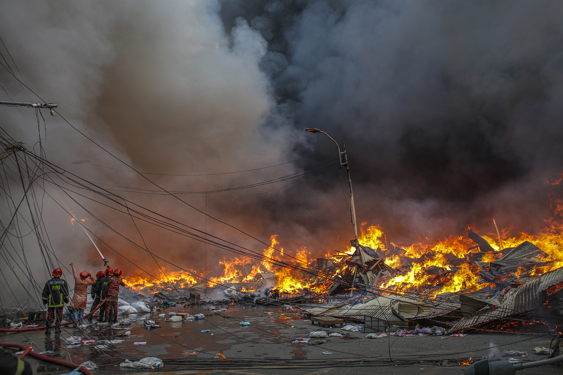 8 firefighters injured; fire started in Adarsha Market