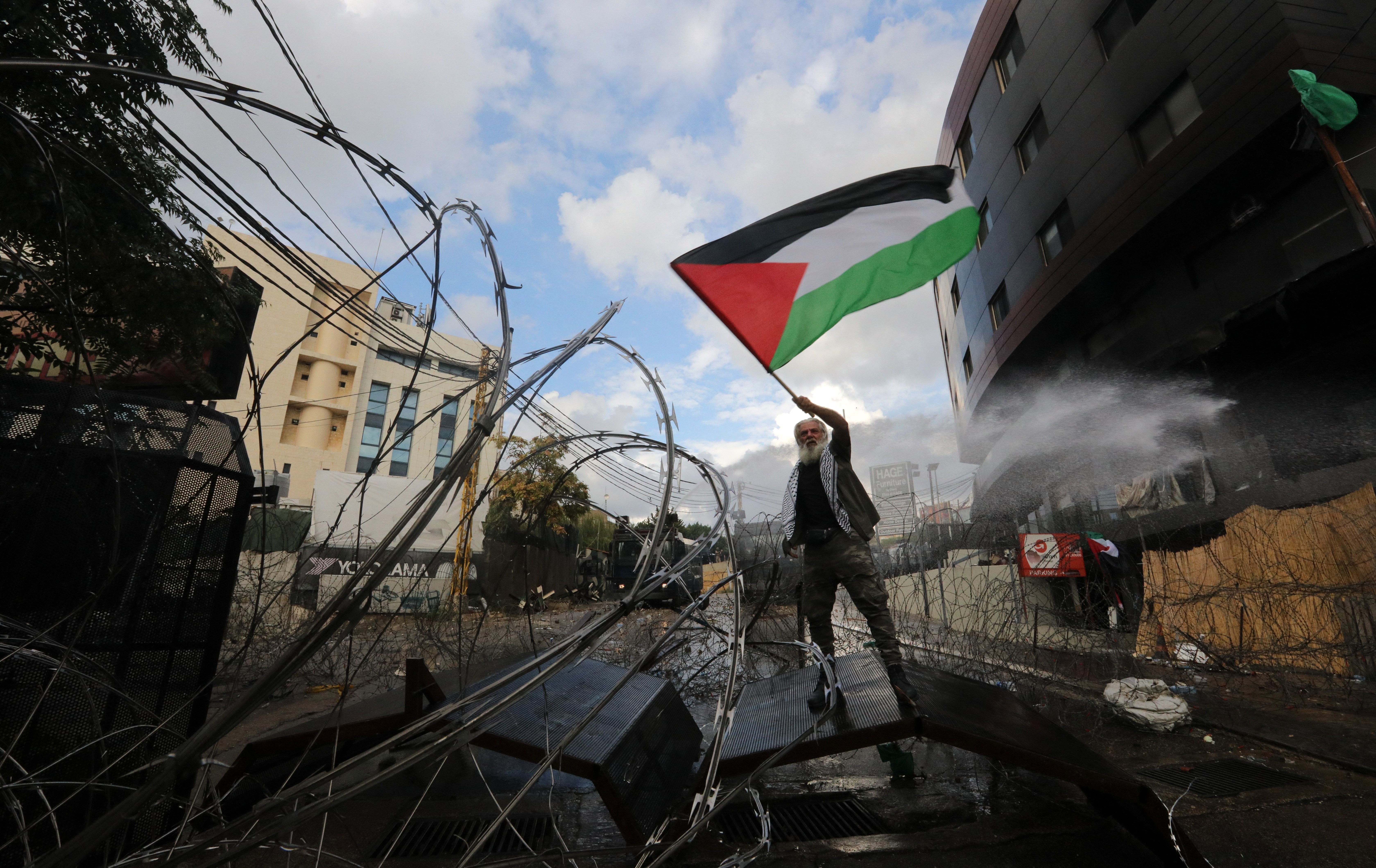 Aid trucks wait at Egypt's border with war-torn Gaza after deal