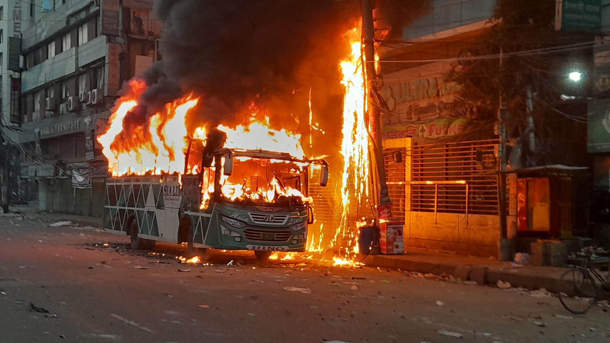 Youths ‘wearing police vest’ set bus on fire at Kakrail