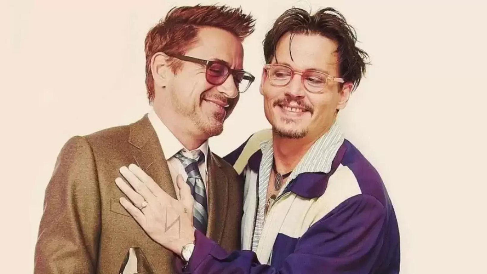 Johnny Depp congratulates Robert Downey Jr on his first Oscar win