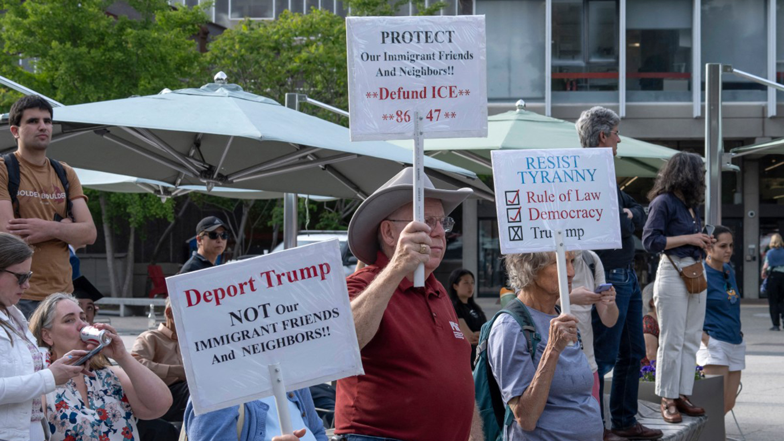 Harvard students march after Trump seeks to cut remaining contracts