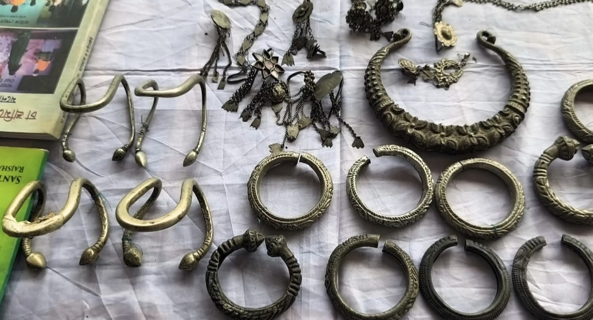 Traditional ornaments, including heavy bracelets and the hansli, are displayed at the Harmony Festival.