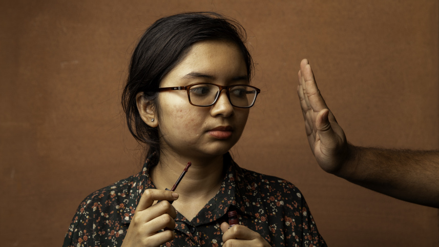 Symbolic image of parent impeding the actions of their child. 