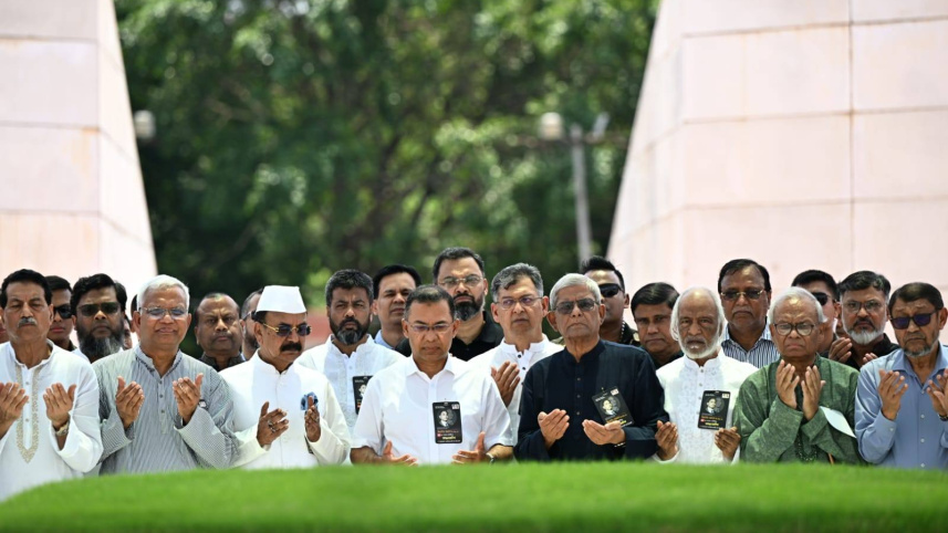 Prime Minister Tarique Rahman, alongside BNP leaders, offers homage at the grave of party founder Ziaur Rahman.