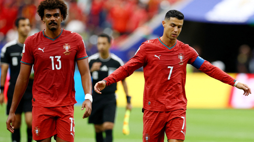 2026-06-17T180050Z_404589240_UP1EM6H1DZ0PM_RTRMADP_3_SOCCER-WORLDCUP-POR-COD.JPG