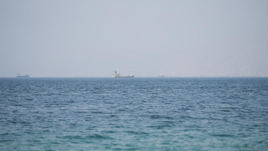 Vessels near the Strait of Hormuz, as seen from Musandam, Oman, August 6, 2026. Photo: Reuters