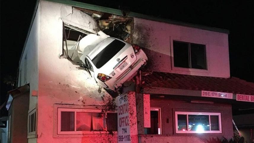 Car flies 20m into upper floor of building