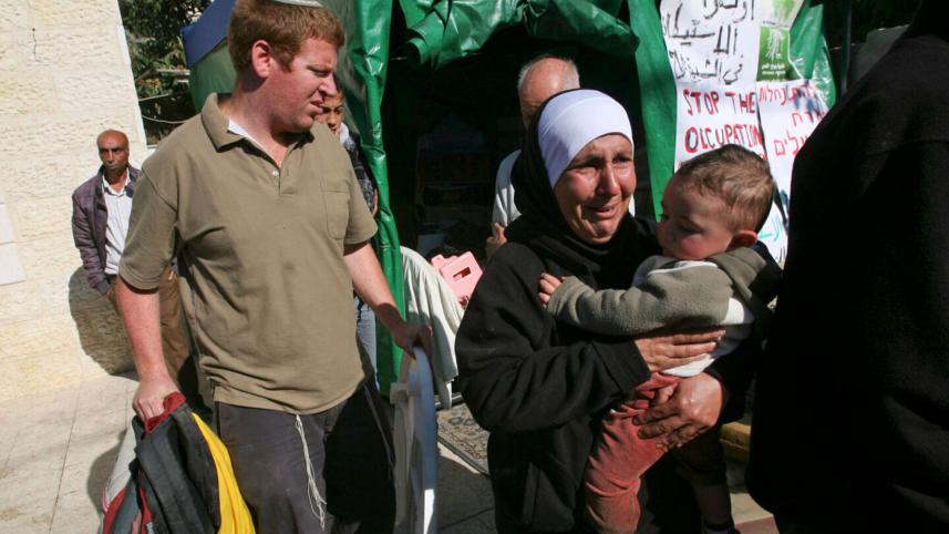 Palestinian-woman-weeps.jpg