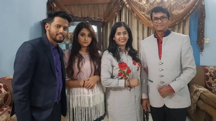 Azizul Hakim with his family.jpg