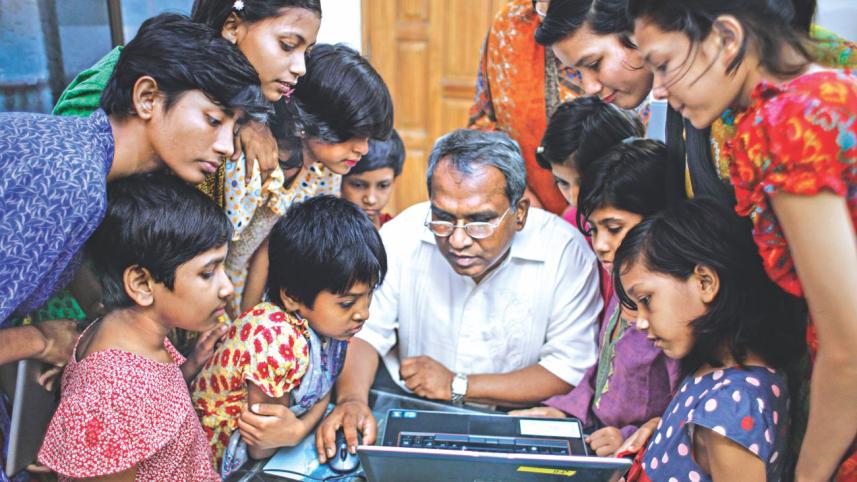 Dr Ehsan Hoque with underprivileged and orphaned children
