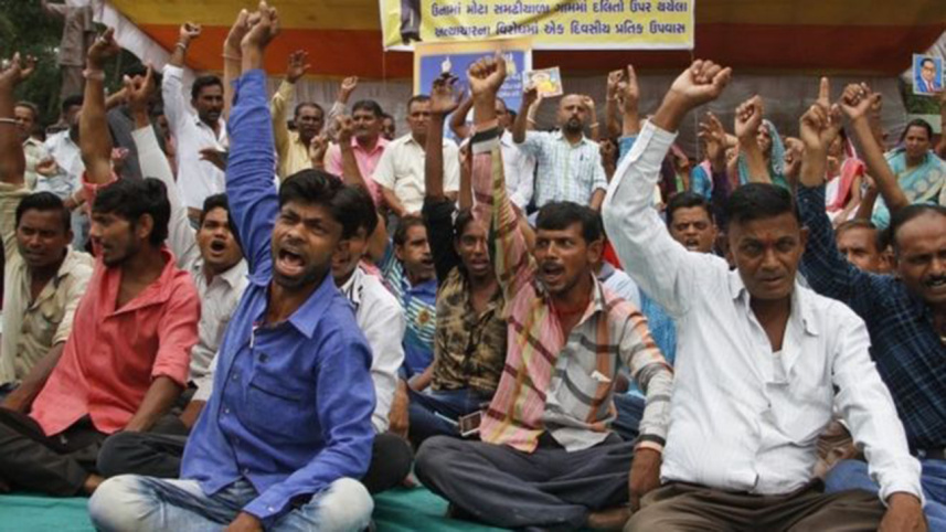 India's Dalit community, Dalit couple, Uttar Pradesh state, 22 cents debt