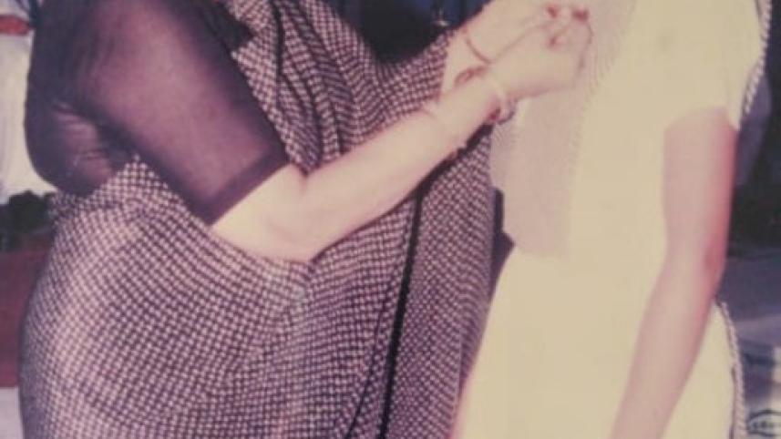 Niloufer Manzur presents Ashreen Mridha with the prefect badge.jpg