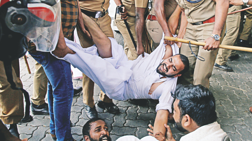 Police remove members.jpg