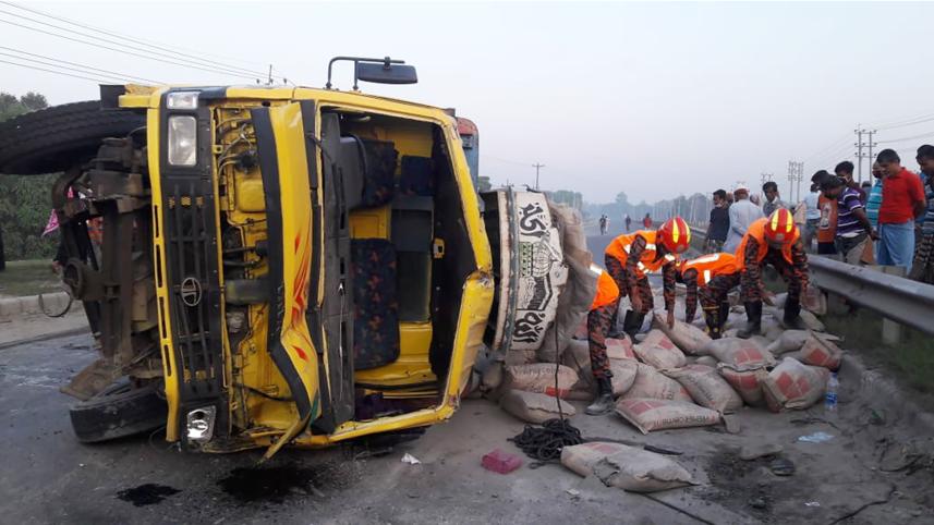 truck overturns in Tangail