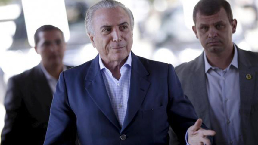 Brazil's Michel Temer arrives at the Planalto Palace in Brasilia.