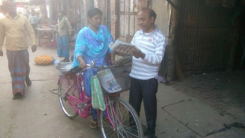 woman paper seller.jpg