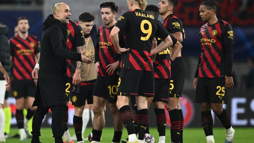 Pep Guardiola and Erling Haaland