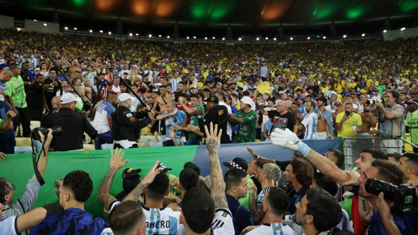 messi_and_argentina_watch_fans_riot_at_marcana.jpg
