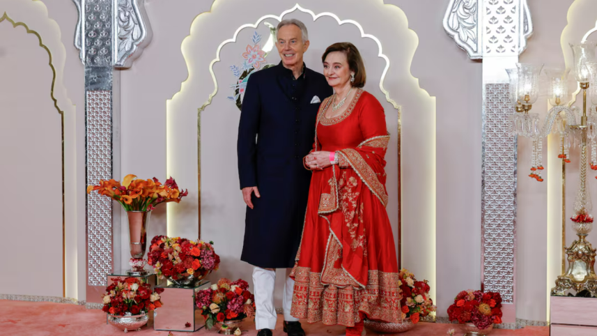 former_british_prime_minister_tony_blair_and_his_wife_cherie_blair_pose_for_pictures_on_the_red_carpet.png