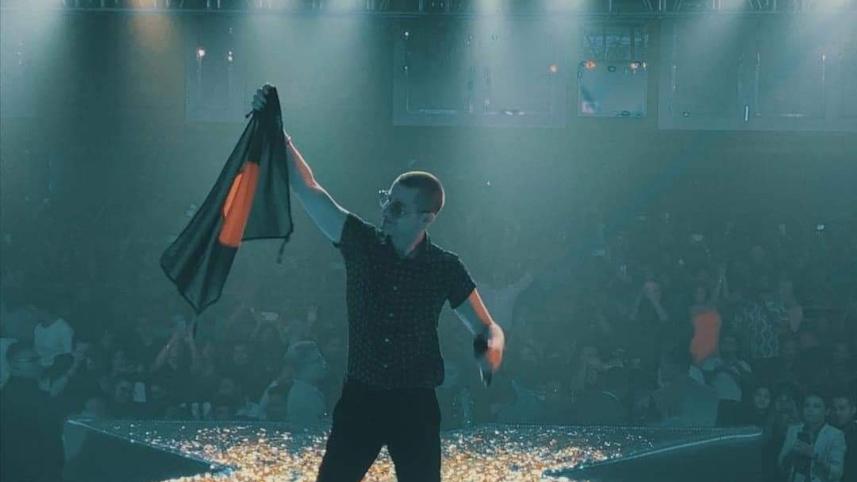 Akcent raises Bangladeshi flag.jpg