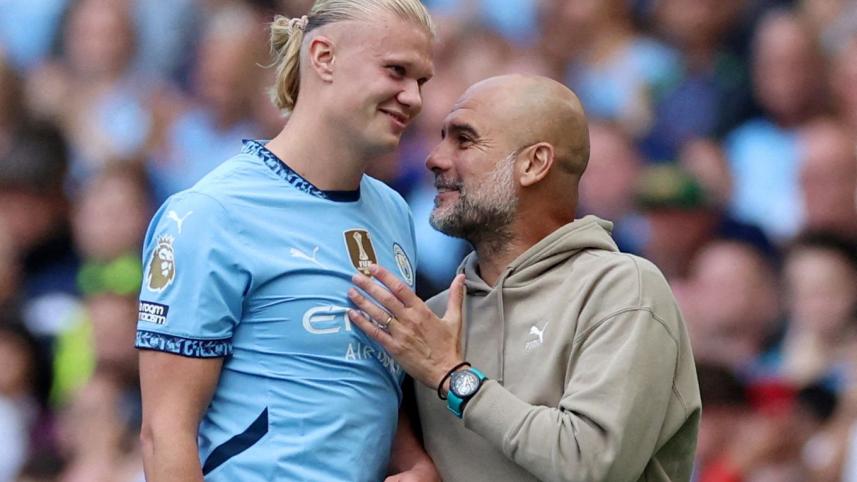 pep_guardiola_with_erling_haaland.jpg