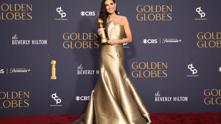 Demi Moore poses with the award for Best Performance by an Actress in a Motion Picture - Musical or Comedy, for The Substance, at the 82nd Golden Globe Awards in Beverly Hills, Californiajpg