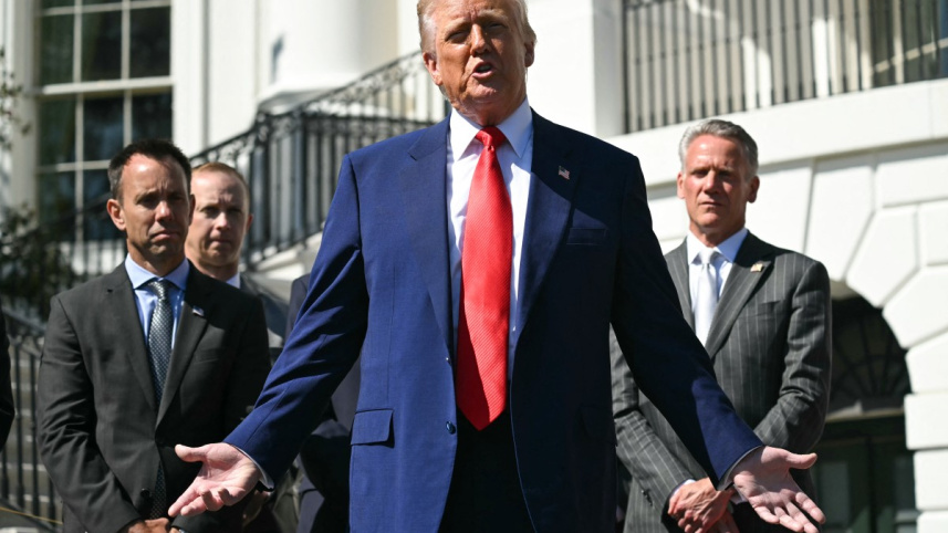 afp_20250409_39rb6qy_v3_preview_topshotuspoliticstrump.jpg