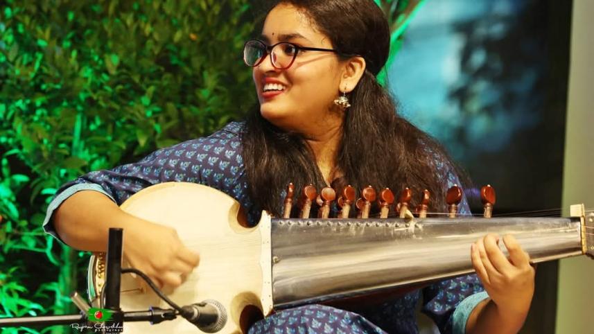 young girls playing sarod in Bangladesh