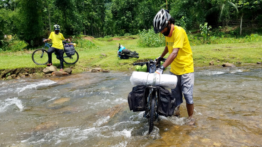 during_thier_trip_the_three_cyclists_travelled_muddy_and_broken_roads_together_to_raise_awareness_about_plastic_pollution.jpg