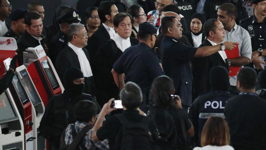 Women on trial visit airport where Kim Jong Nam was attacked