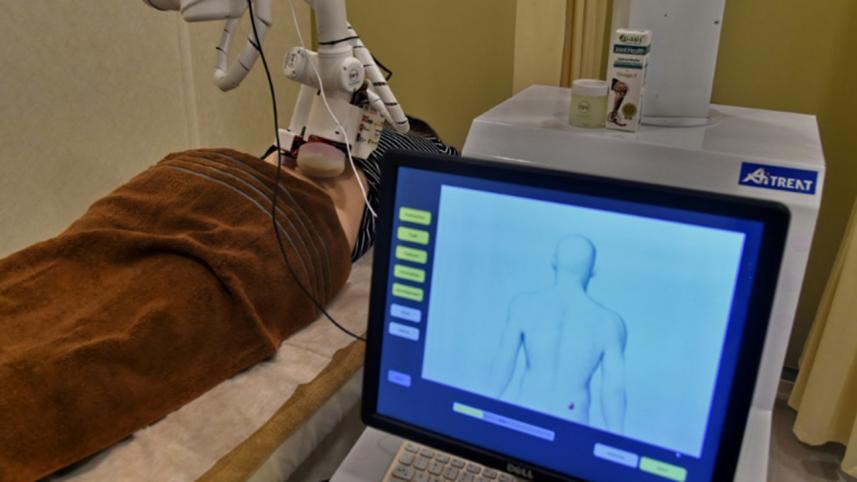 Emma the robot masseuse gets to work in Singapore