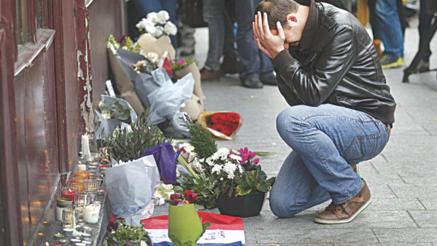 A man pays his respect.jpg