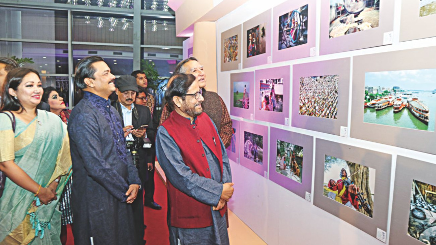 Chief Guest Asaduzzaman Noor MP visiting the photo exhibition