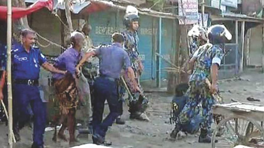 cop villagers clash 4.jpg