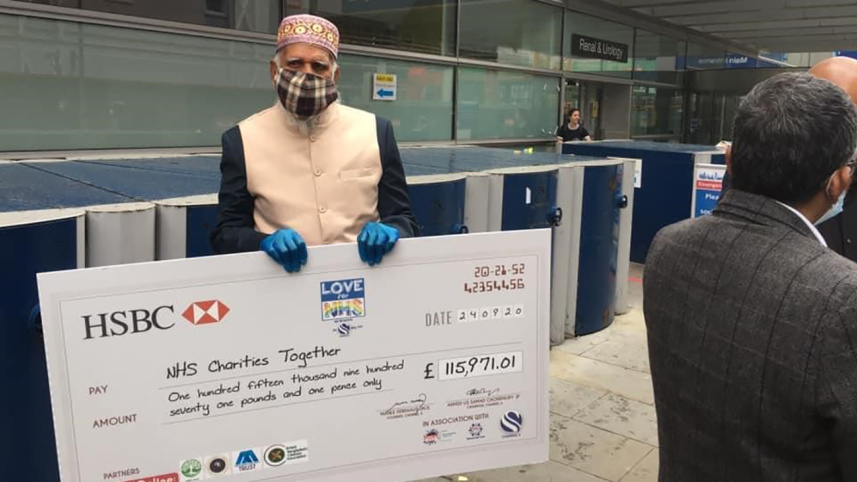 dabirul_with_cheque_for_nhs.jpg