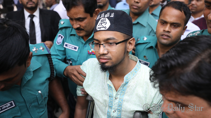 one_of_the_convicts_is_seen_wearing_a_cap_with_is_logo_after_the_verdict._photo-anisur_rahman.jpg