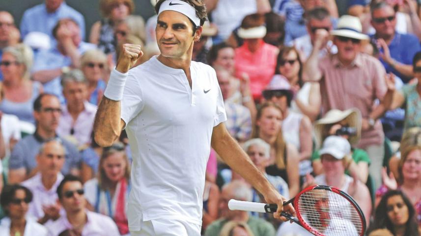 Roger Federer pumps fist.jpg
