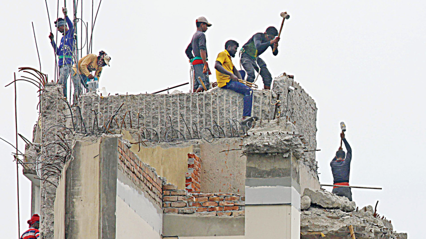 workers demolishing
