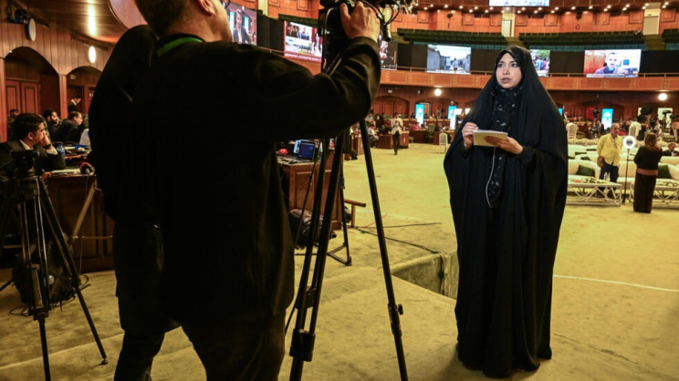 Iranian journalists were seated on the opposite end of the cavernous hall from their US counterparts. Photo: AFP