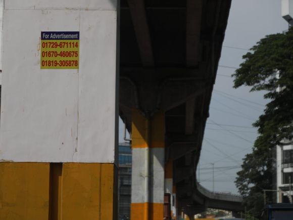 Stickers calling for advertisements are now seen on the pillars of the elevated expressway in Chattogram. Photo: Star