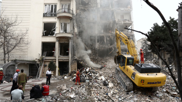 A view of a residential building damaged by a strike, amid the U.S.-Israeli conflict with Iran, in Tehran, Iran, March 23, 2026. Photo: Reuters