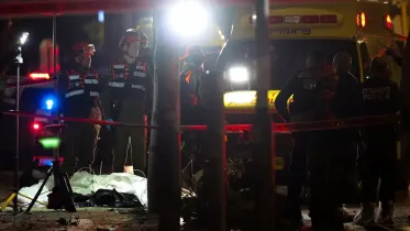 Israeli rescue workers stand near an ambulance behind a security cordon at the impact site following Iranian missile barrages, amid the U.S.-Israel conflict with Iran, in Tel Aviv, Israel, March 28, 2026. File photo: Reuters