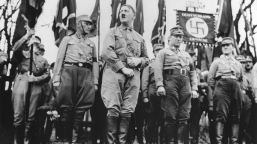 Hitler with Nazi Party members.jpeg