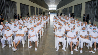 Members of Mara Salvatrucha, also known as MS-13 gang, attend an open hearing by El Salvador prosecutors against 486 members of the gang, who are accused of more than 47,000 crimes committed between 2012 and 2022. Photo: Reuters